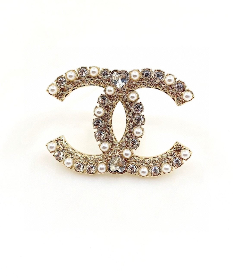 Ch**el brooches